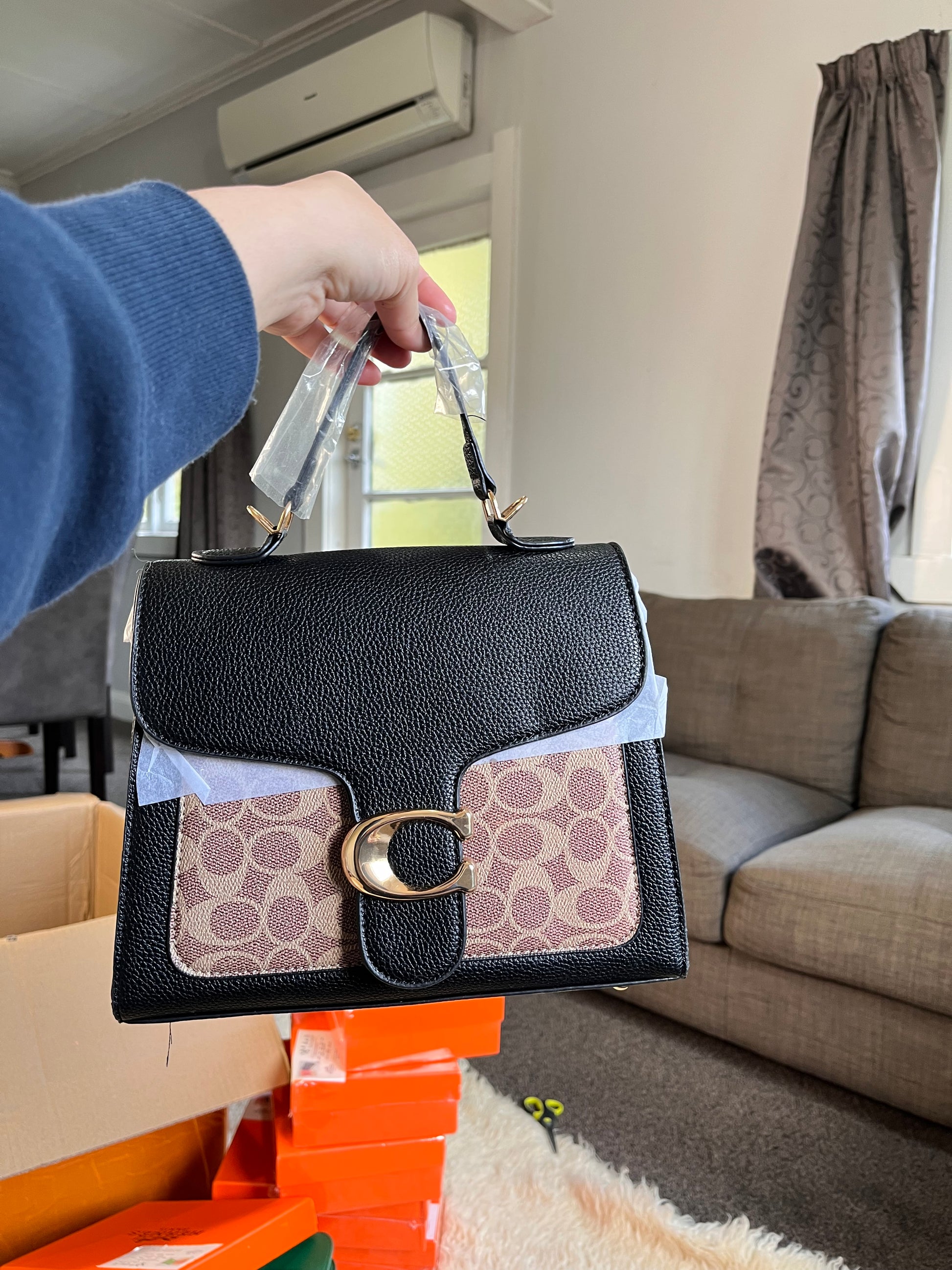 Coach leather handcarry and crossbody bag