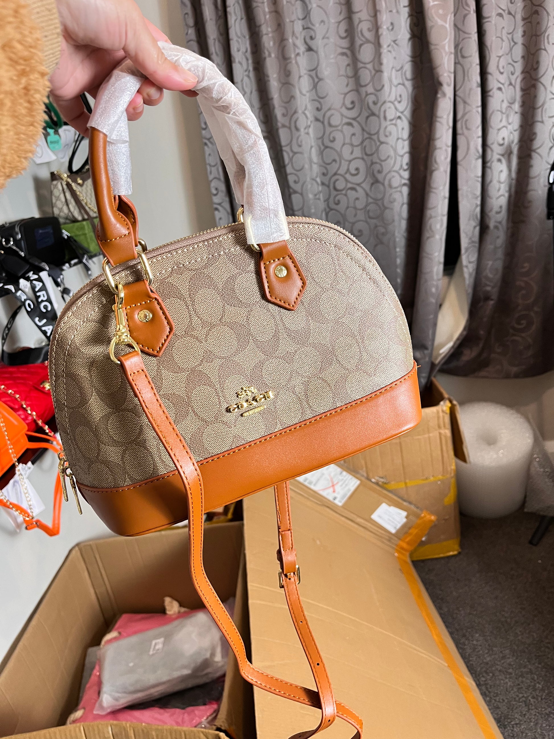 Coach leather hand carry or crossbody bag
