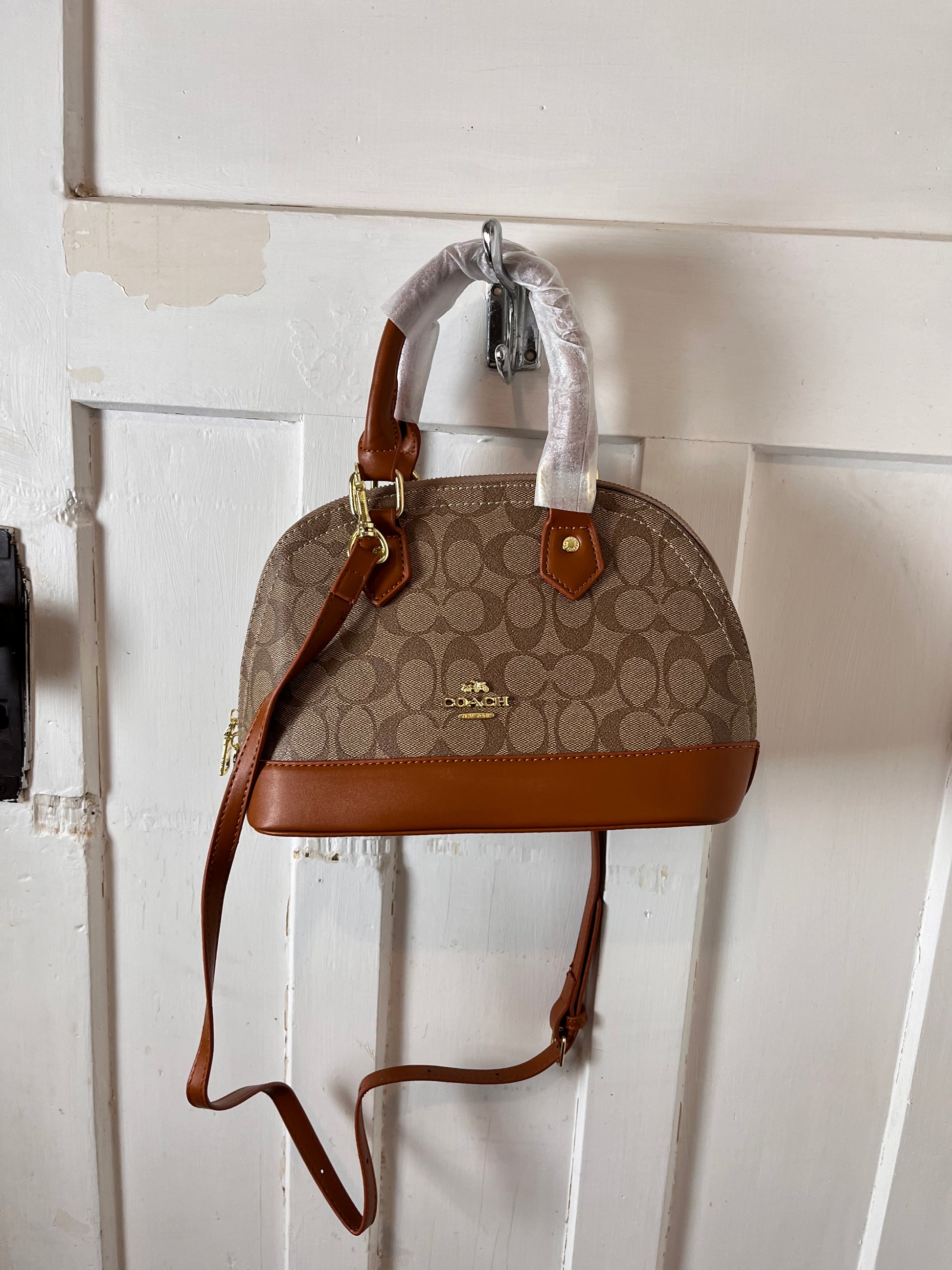 Coach leather hand carry or crossbody bag