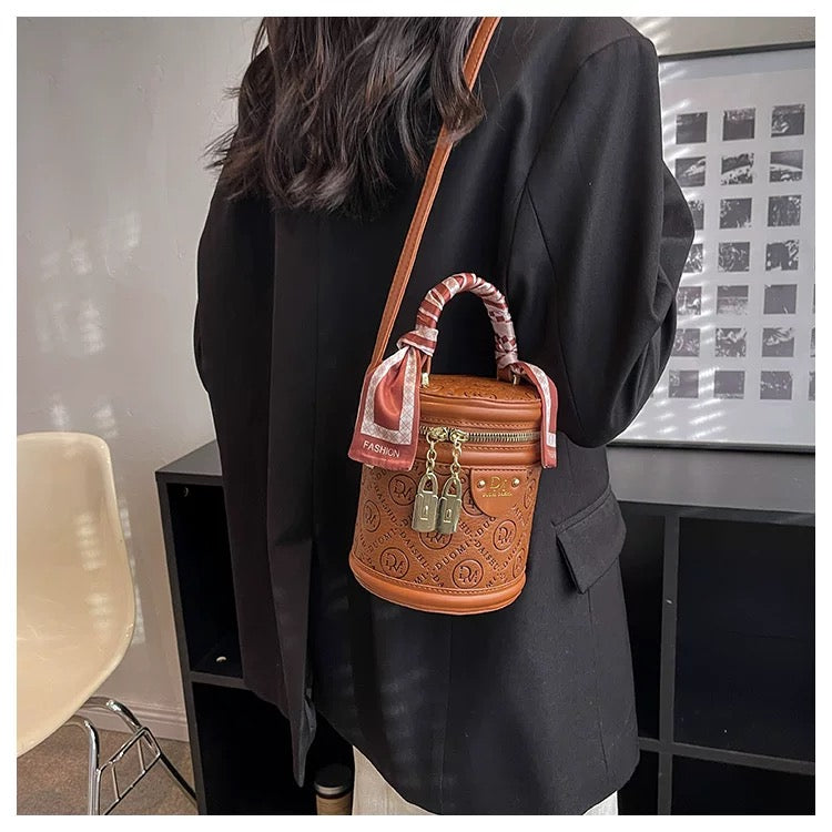 High end textured crossbody and hand carry small bag with twilly