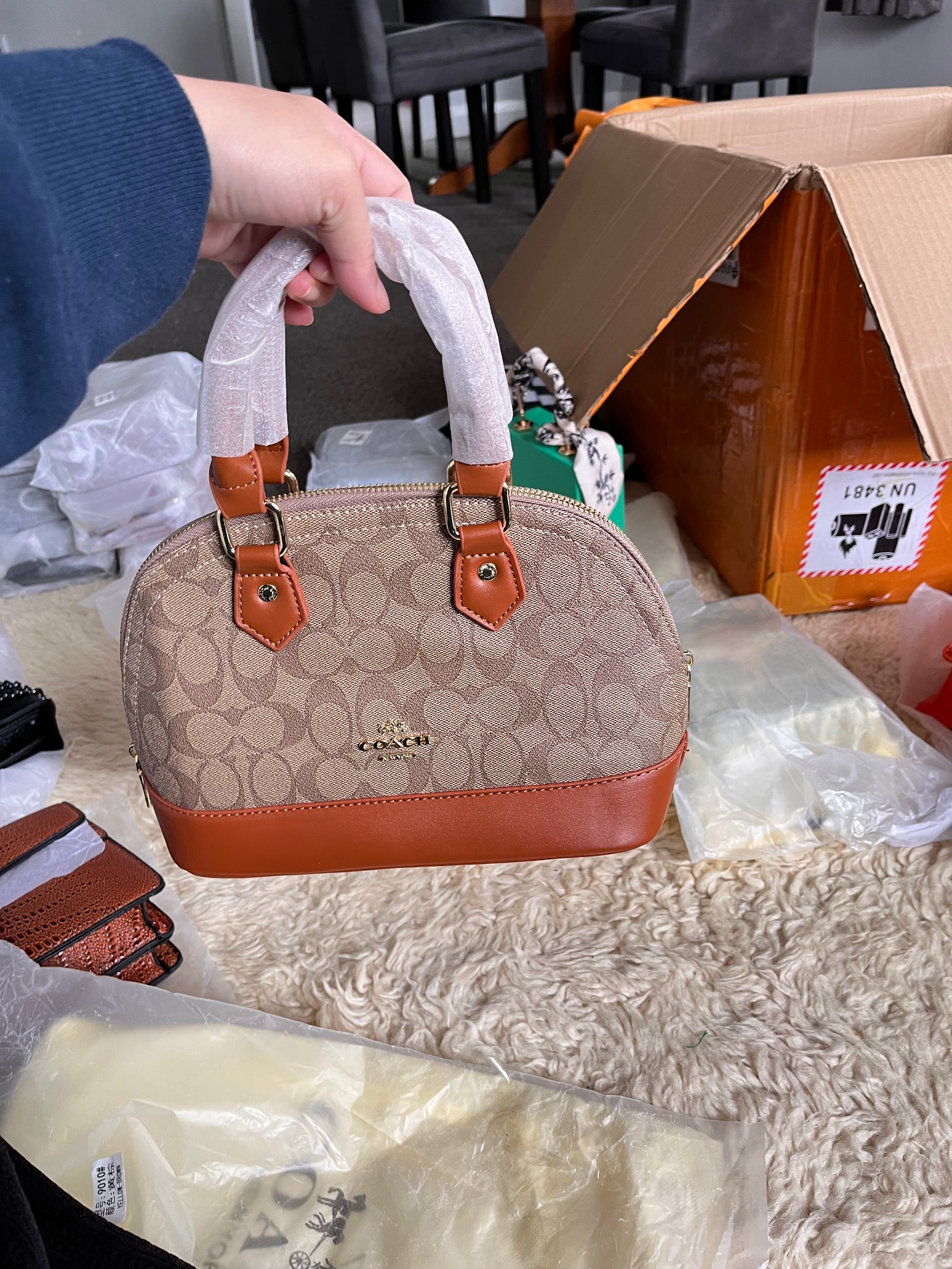 Coach leather hand carry or crossbody bag