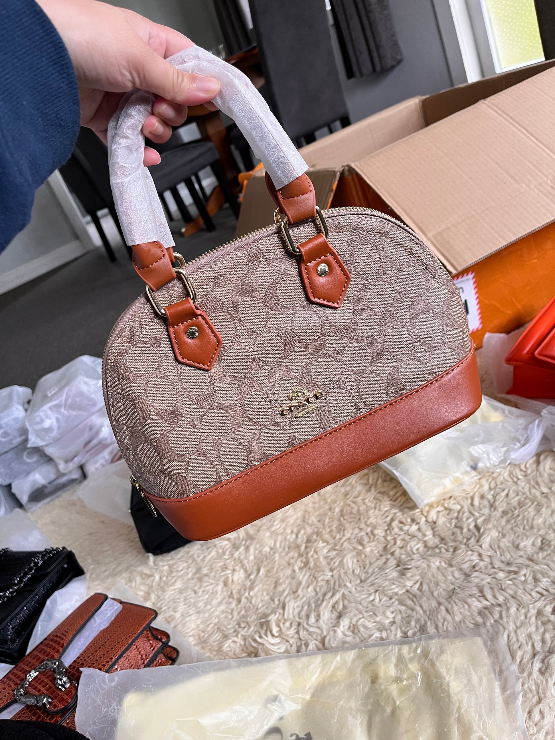 Coach leather hand carry or crossbody bag