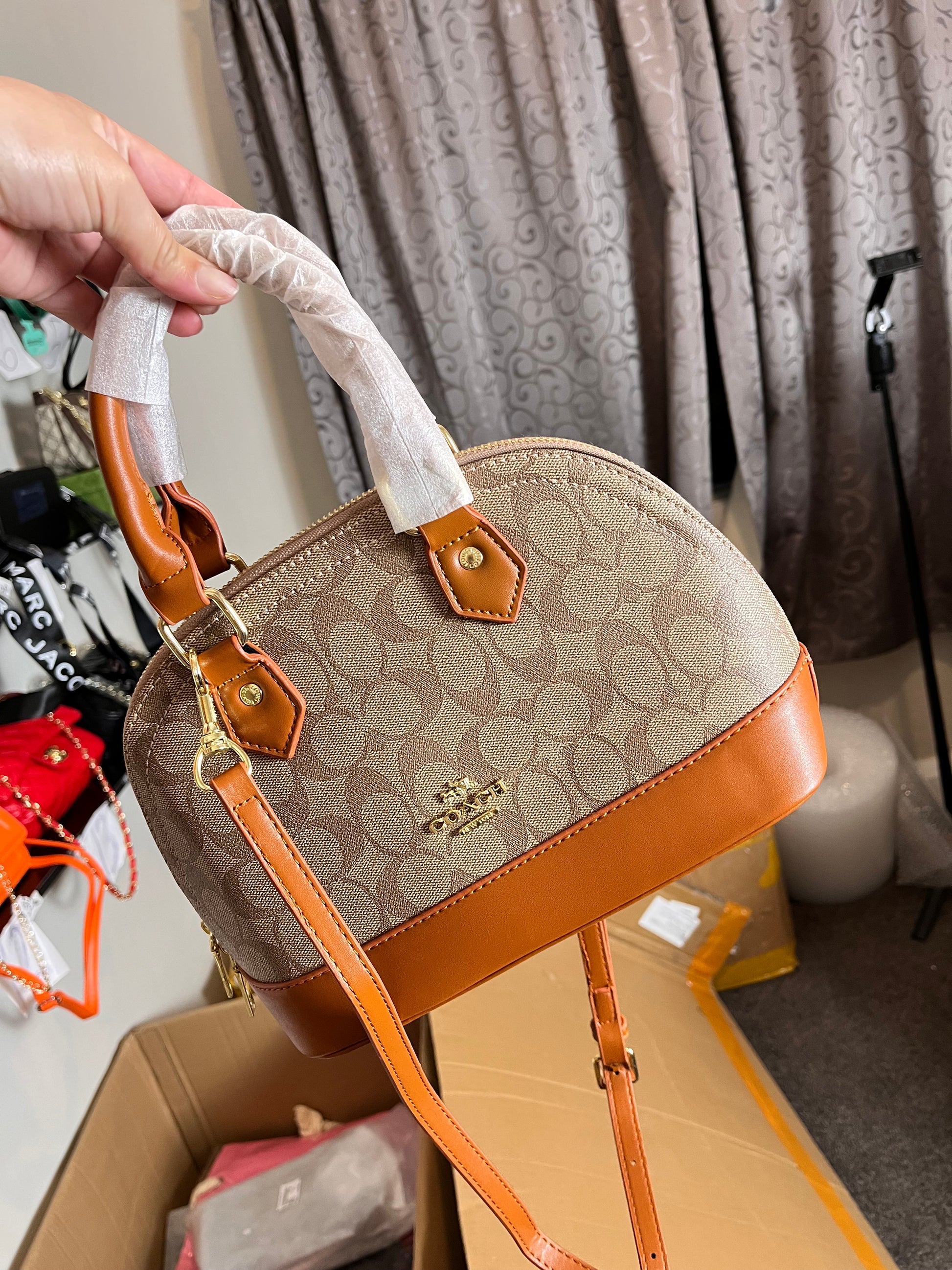 Coach leather hand carry or crossbody bag